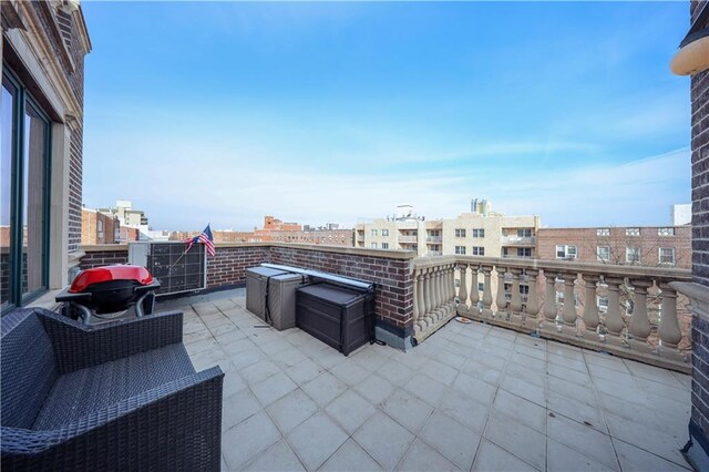 view of patio / terrace with a balcony