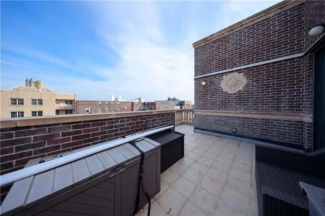 view of patio with a jacuzzi