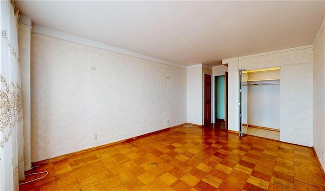 unfurnished bedroom with parquet floors