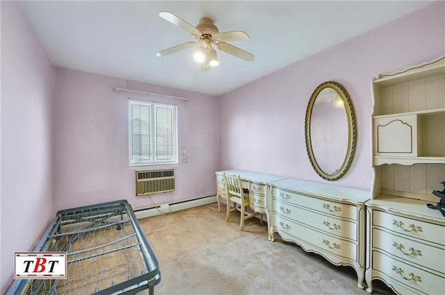 bedroom with carpet, a baseboard heating unit, a wall unit AC, and a ceiling fan