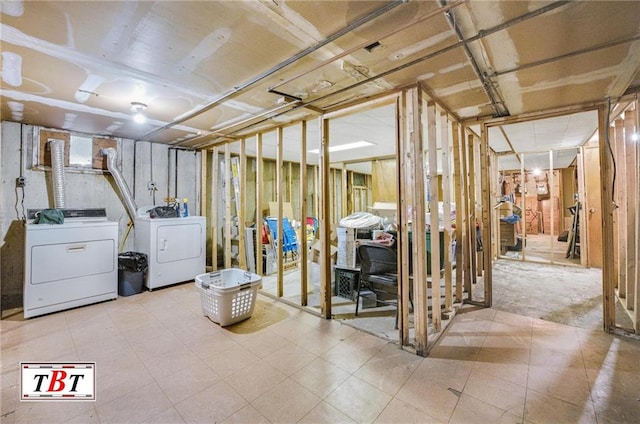 basement with washing machine and dryer