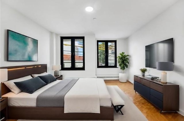 bedroom featuring parquet floors