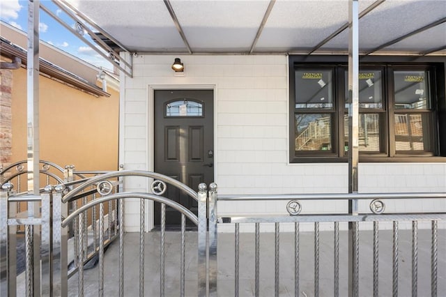 doorway to property with a gate