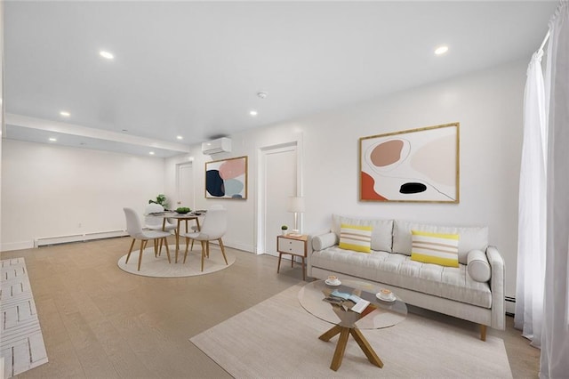 living room with light hardwood / wood-style flooring, a wall mounted air conditioner, and a baseboard radiator