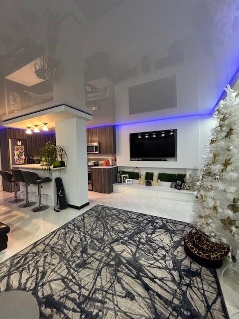 living room featuring light tile patterned floors