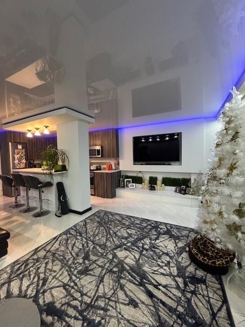 living room with light tile patterned flooring