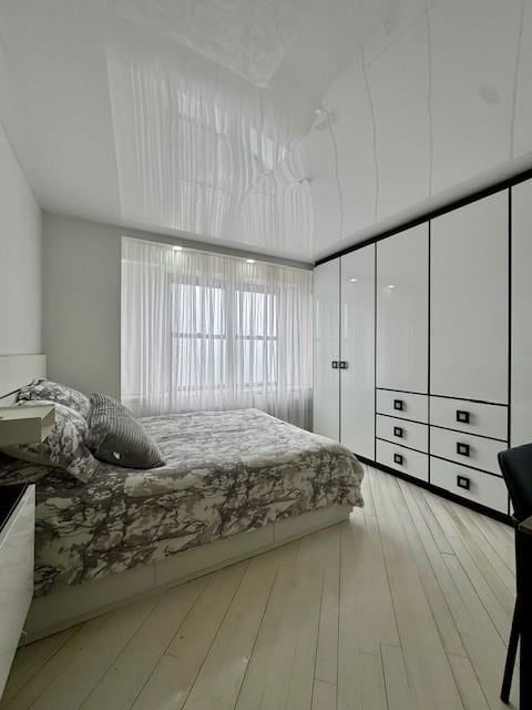 501 Surf Ave Unit 23B, Brooklyn, NY 11224 - bedroom with light wood-style floors