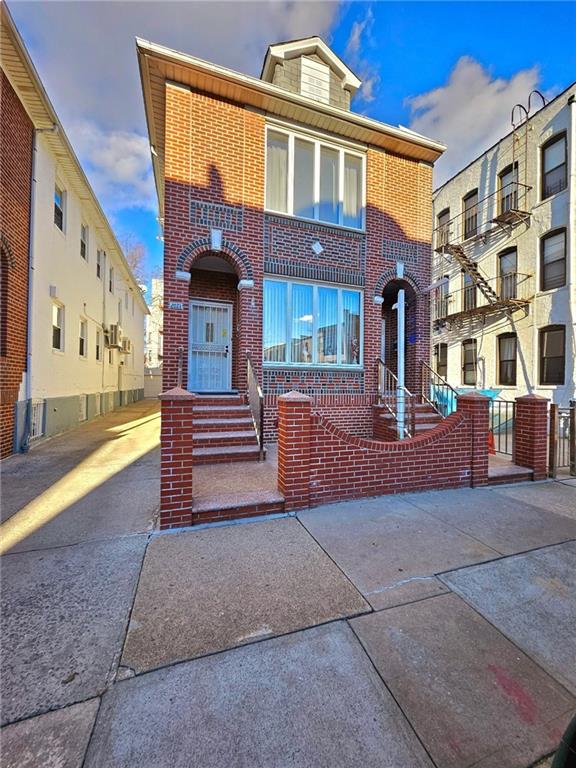 2071 72nd St, Brooklyn, NY 11204 - view of front of house featuring brick siding