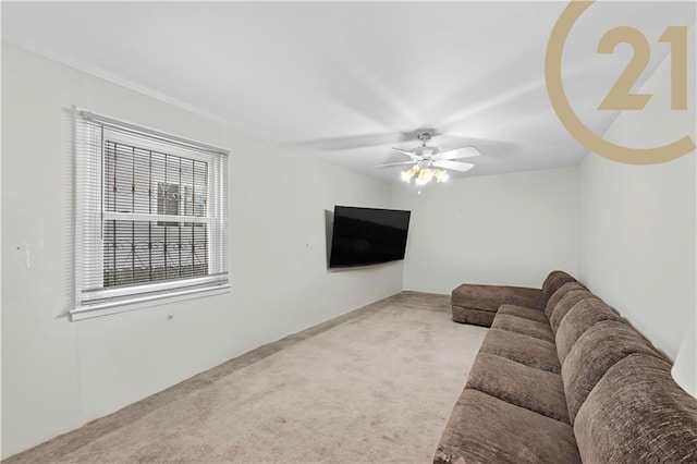 living room featuring light carpet and ceiling fan