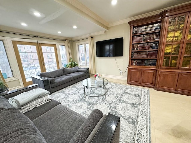 living room featuring crown molding