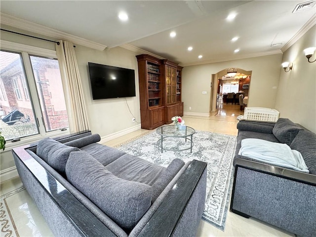 living room with ornamental molding