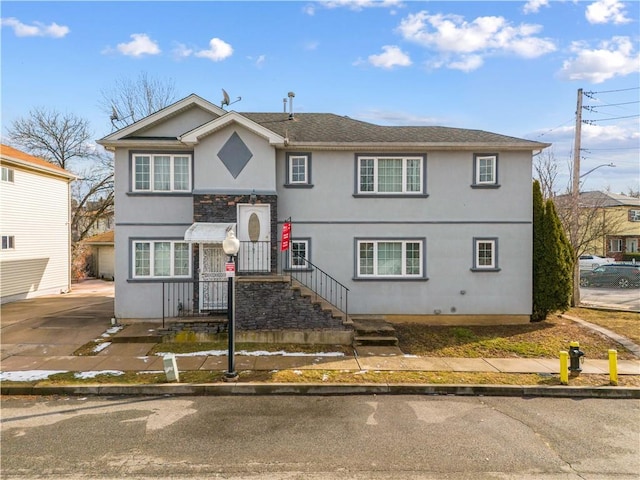 view of front of home with stucco siding