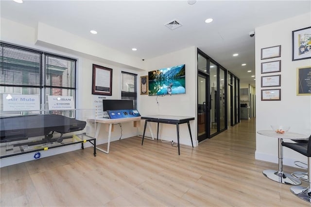 office area featuring baseboards, recessed lighting, visible vents, and light wood-style floors