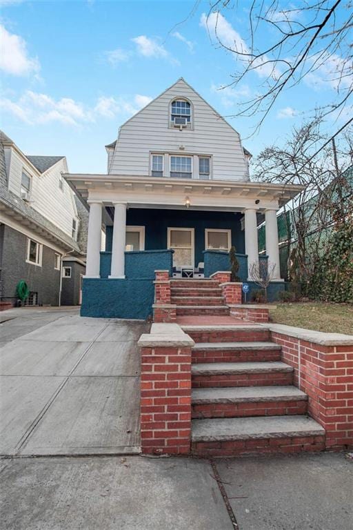 view of front of home featuring covered porch