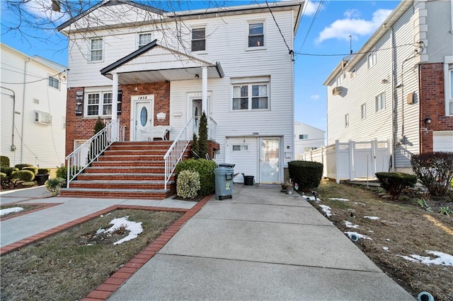 view of front of home with fence