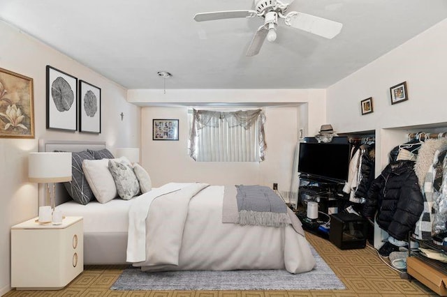 bedroom featuring ceiling fan