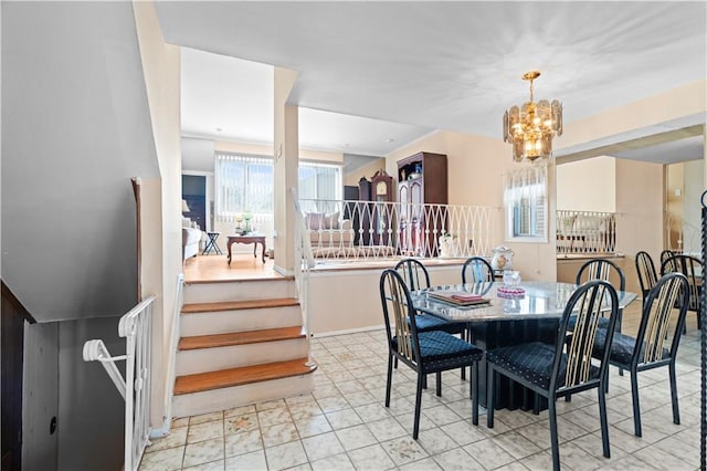 dining space with a chandelier