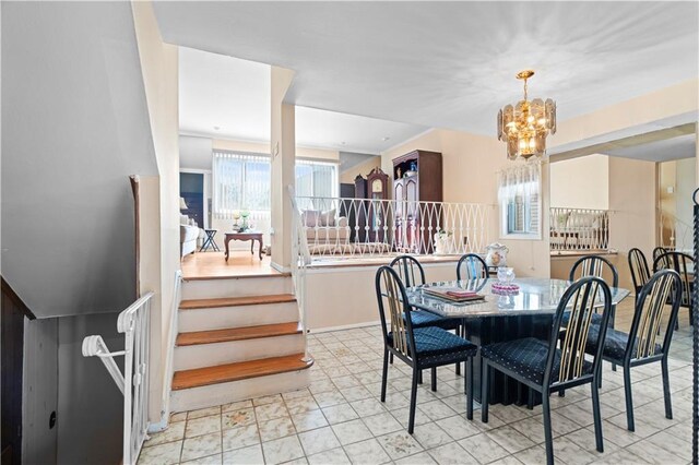 dining area with a chandelier