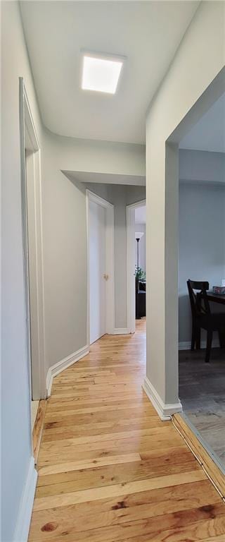 corridor featuring light hardwood / wood-style flooring