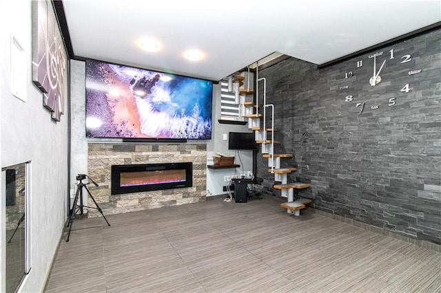 tiled living area featuring a fireplace