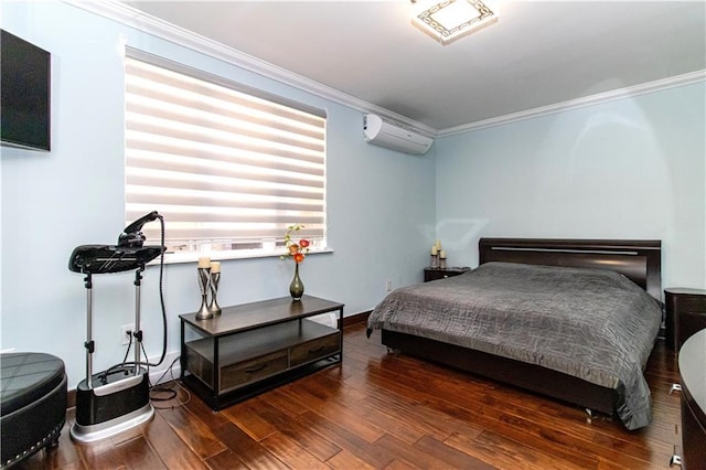 bedroom with crown molding, a wall mounted air conditioner, dark wood finished floors, and baseboards