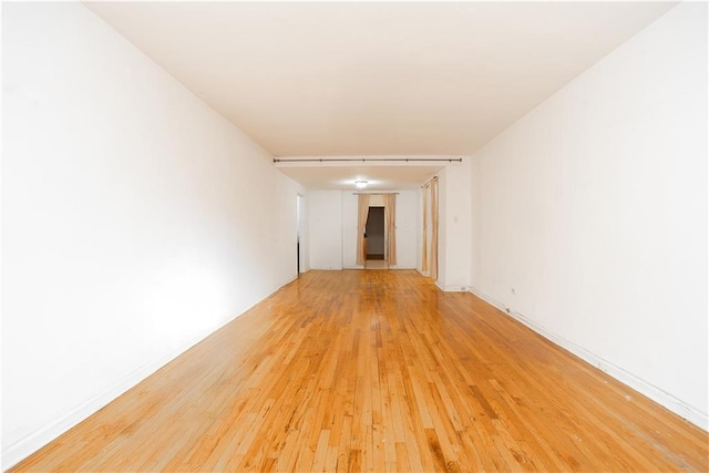 empty room featuring light wood-style flooring