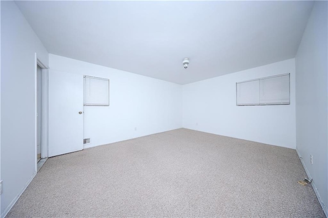 empty room with carpet floors