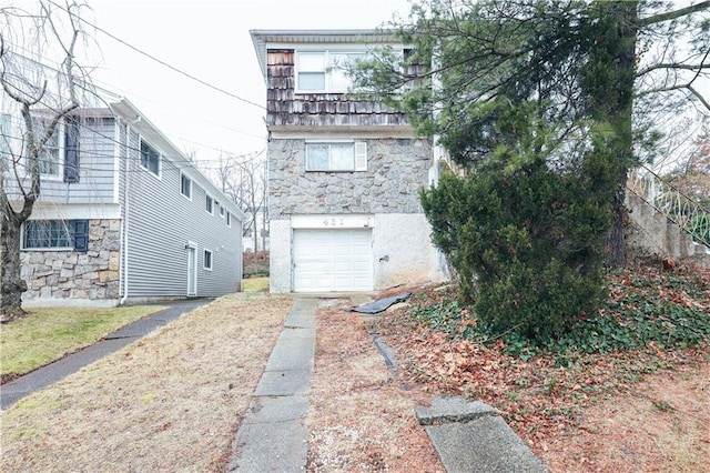 view of front of property featuring a garage