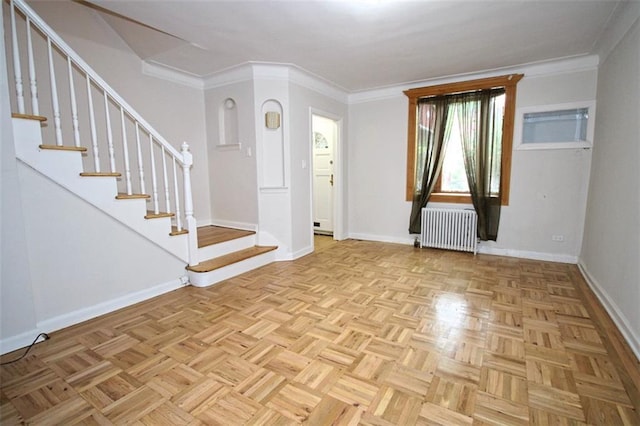 298 Bay 14th St, Brooklyn, NY 11214 - foyer with radiator heating unit, stairway, and ornamental molding