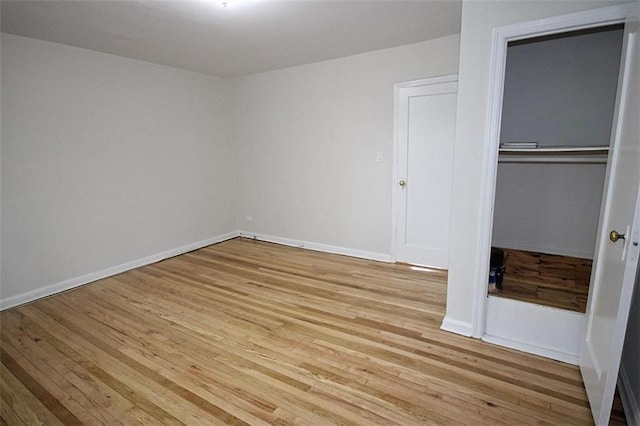 298 Bay 14th St, Brooklyn, NY 11214 - unfurnished bedroom featuring light wood-type flooring and a closet