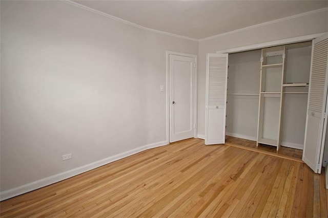 298 Bay 14th St, Brooklyn, NY 11214 - unfurnished bedroom with light wood-type flooring, crown molding, and a closet
