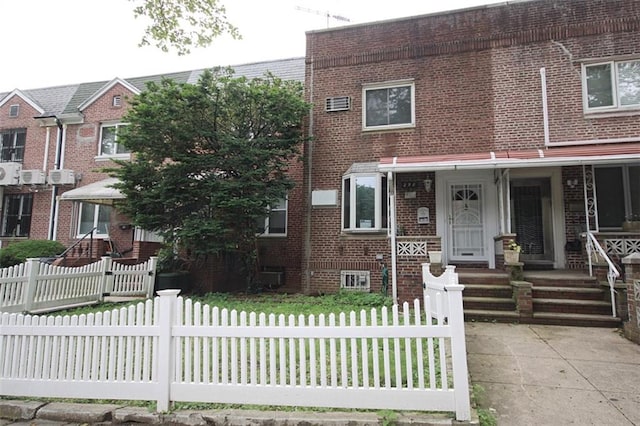 298 Bay 14th St, Brooklyn, NY 11214 - townhome / multi-family property featuring brick siding and a fenced front yard