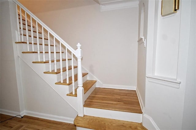 298 Bay 14th St, Brooklyn, NY 11214 - staircase featuring baseboards and wood finished floors