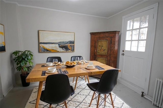 298 Bay 14th St, Brooklyn, NY 11214 - dining space featuring radiator heating unit and crown molding