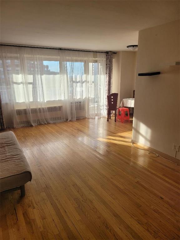 interior space with hardwood / wood-style flooring