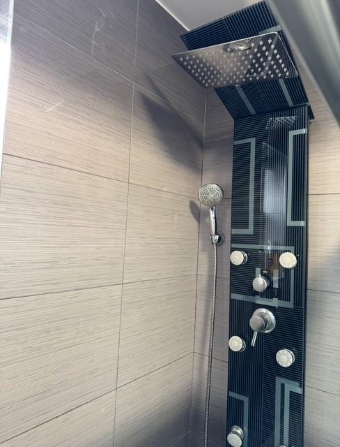 393 Avenue S Unit 5H, Brooklyn, NY 11223 - room details featuring tiled shower