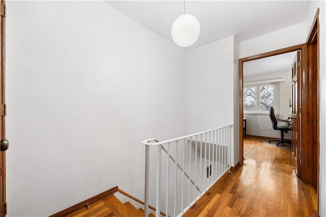 42 Narrows Rd S Unit 1, Staten Island, NY 10305 - hallway with an upstairs landing, hardwood / wood-style flooring, and baseboards