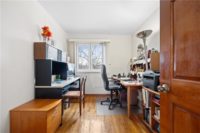 home office featuring light wood-style floors and baseboards