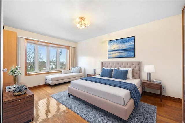 42 Narrows Rd S Unit 1, Staten Island, NY 10305 - bedroom featuring baseboards and wood finished floors