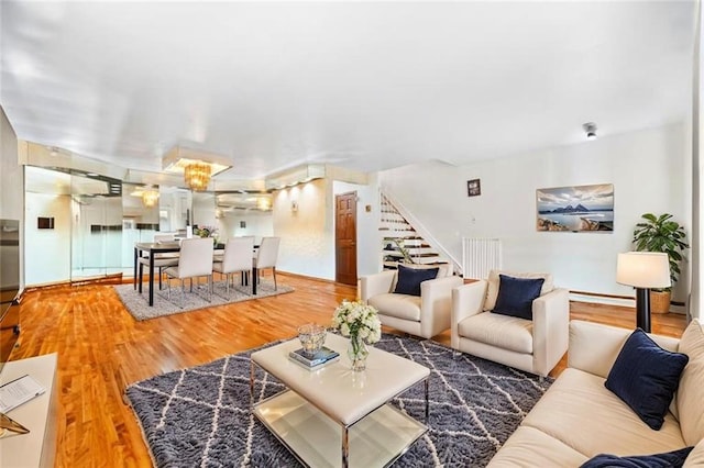 42 Narrows Rd S Unit 1, Staten Island, NY 10305 - living room featuring stairway and wood finished floors
