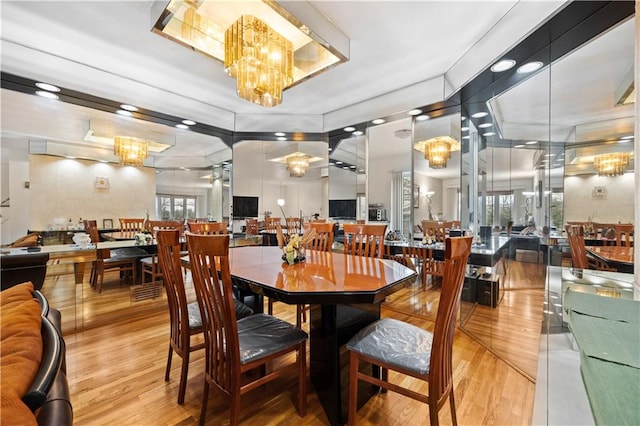 42 Narrows Rd S Unit 1, Staten Island, NY 10305 - dining space featuring a chandelier and wood finished floors