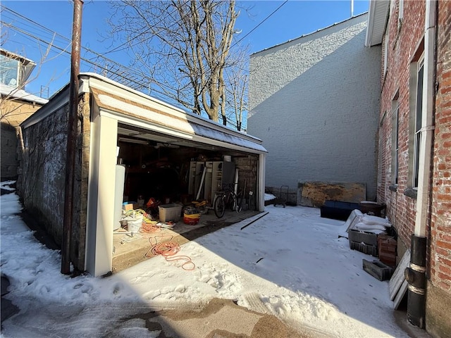 view of snow covered garage