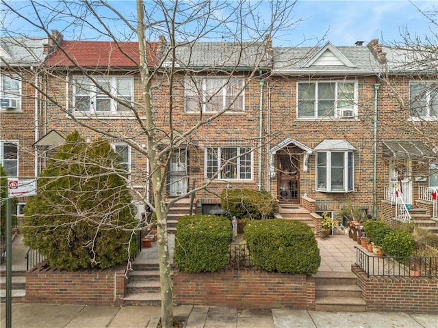 multi unit property featuring brick siding