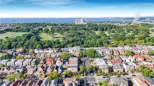 birds eye view of property featuring a residential view and a water view