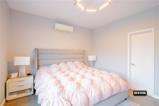 bedroom featuring a wall mounted AC