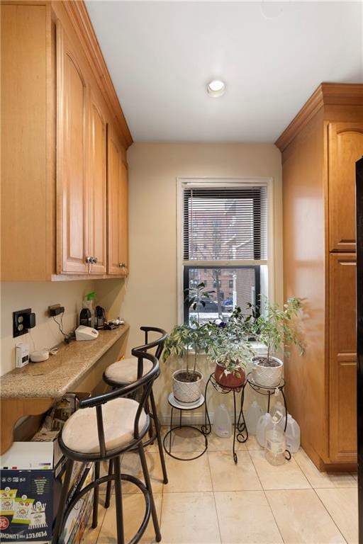 dining room with light tile patterned floors
