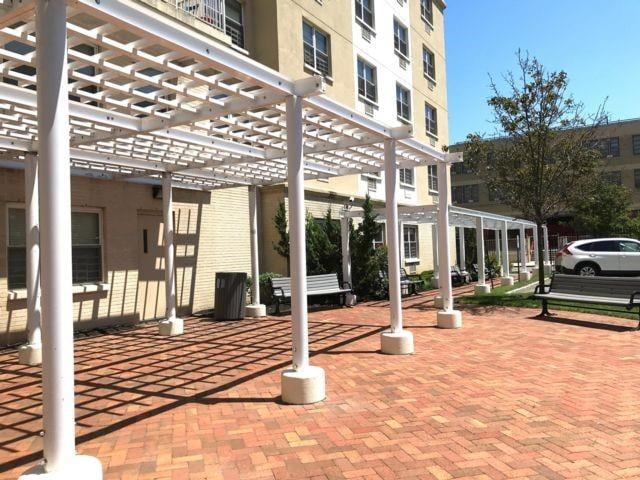 260 Bch 81st St Unit 4M, Rockaway Beach, NY 11693 - view of patio / terrace featuring a pergola
