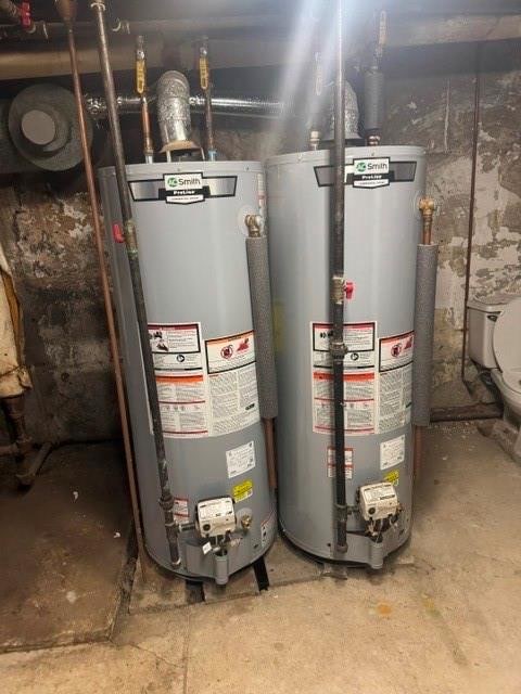 utility room featuring gas water heater