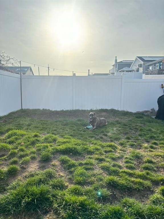 view of yard featuring fence