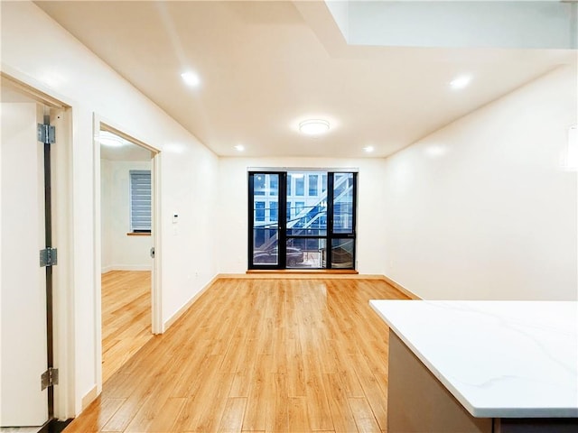 42-22 Crescent St Unit 2C, Long Island City, NY 11101 - empty room featuring light wood-type flooring and recessed lighting